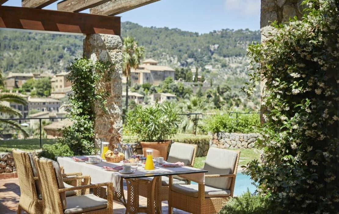 An outdoor restaurant in hotel Belmond La Residencia, Deia